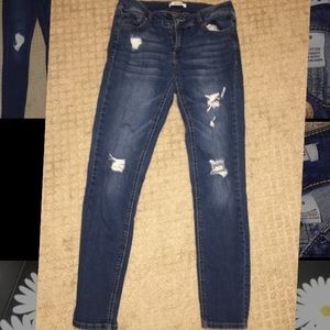 Dark wash ripped skinny jeans